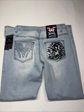 rebels Light Blue Distressed Jeans with Skull Buttons